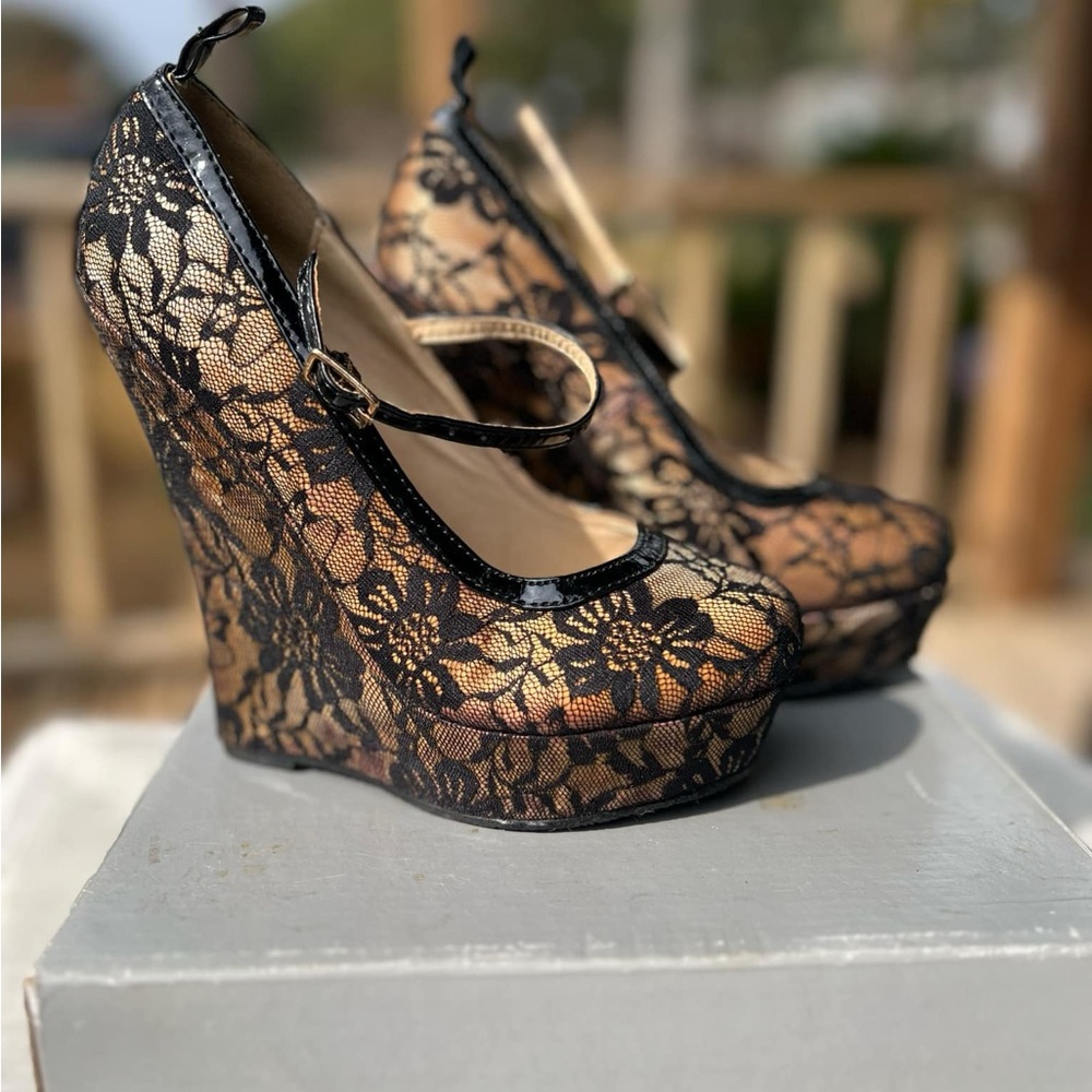 Privileged Black and Gold Heels with Intricate Design